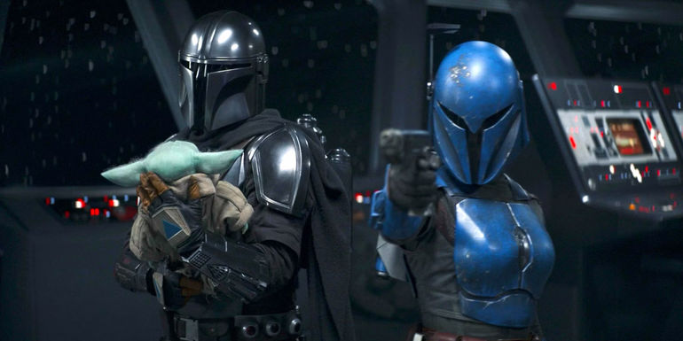 Din Djarin and Grogu walk by Koska Reeves on the bridge in The Mandalorian season 2 finale