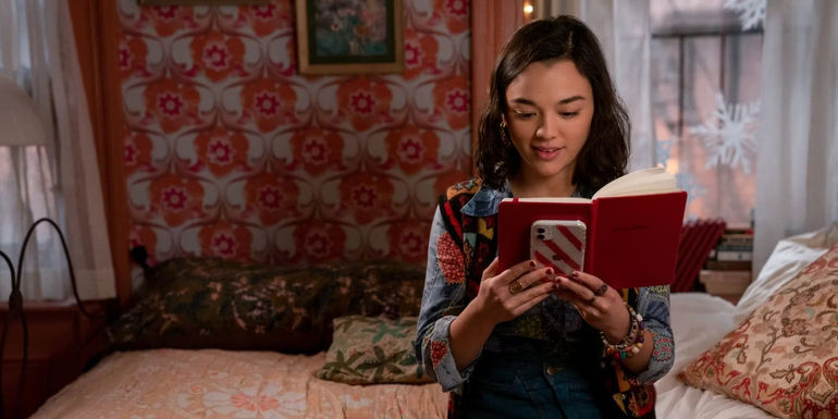 Midori Francis reads a notebook as Lily in Dash & Lily