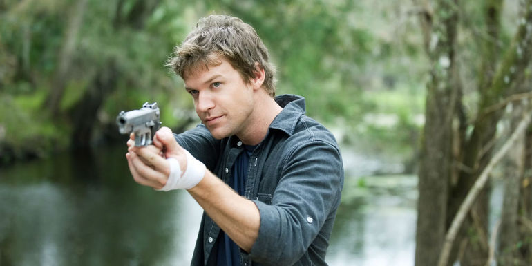 Jim Longworth with a gun on The Glades. 