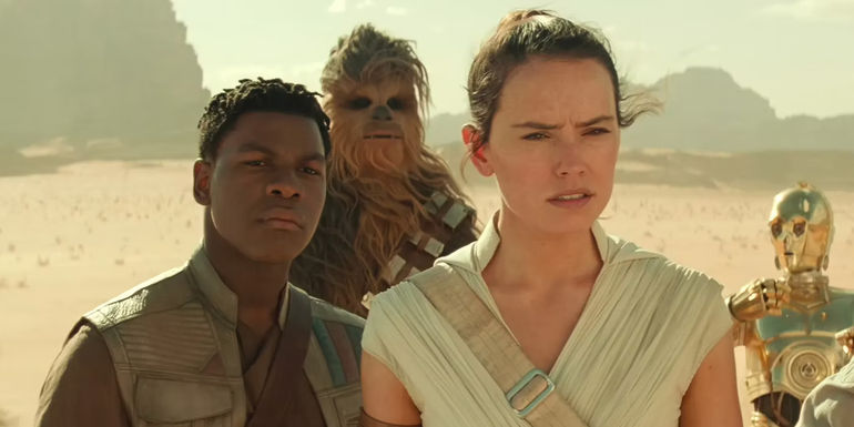 Rey (Daisy Ridley), Finn (John Boyega), Chewbacca, and C-3PO in Star Wars: Episode IX - The Rise of Skywalker.