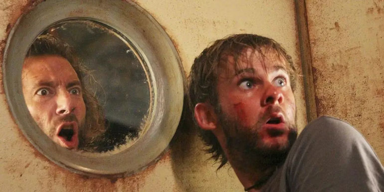 Henry Ian Cusick as Desmond yelling throw a glass window at Dominic Monaghan as Charlie in Lost