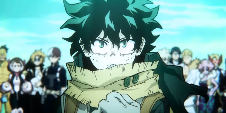 Image shows Deku clutching his chest while his eyes look determined into the frame. His friends from Class 1A behind him ready to anything.