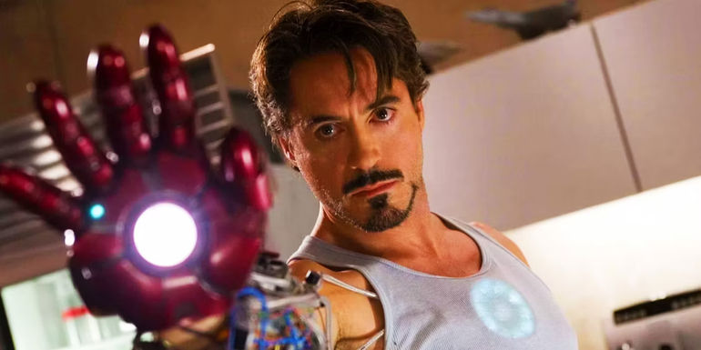 Tony Stark with metal hand in Iron Man