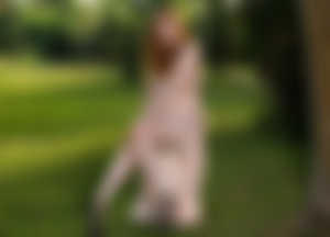 Model,Women,Redhead,Brown eyes,Legs,High heels,Dress,Pink dress,Trees,Grass,Feet,Bare shoulders,Sitting,HD Wallpaper
