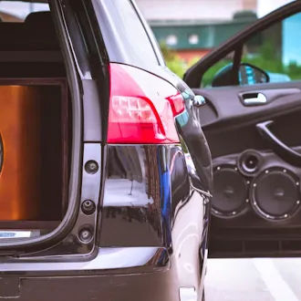 Car delivery service with open trunk for transport and logistics