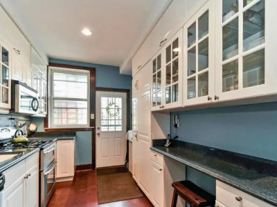 River North kitchen before remodel with dated wood-look cabinets