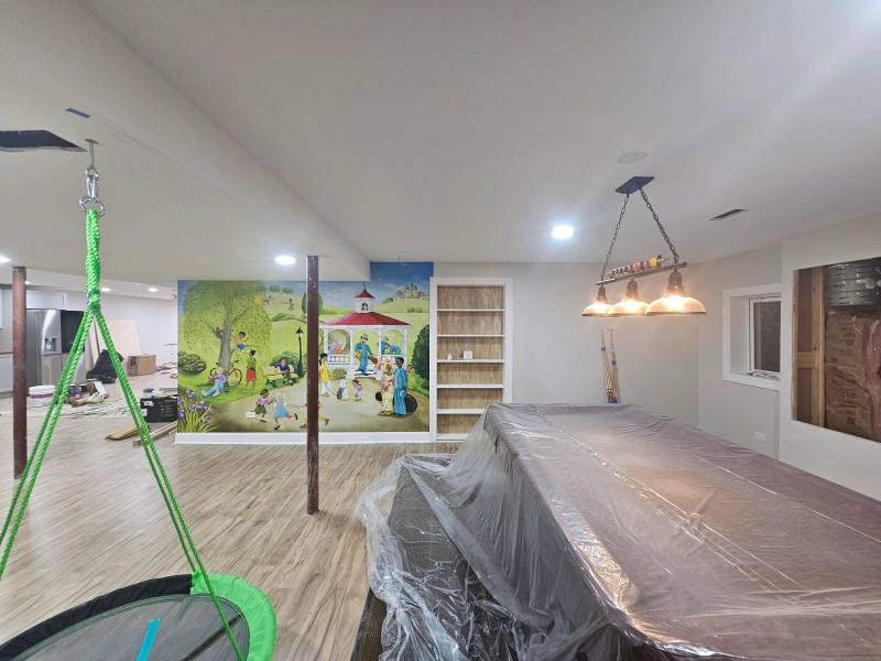 After -- close-up of playhouse wallpaper installation work at Kimmer Court, Lake Forest