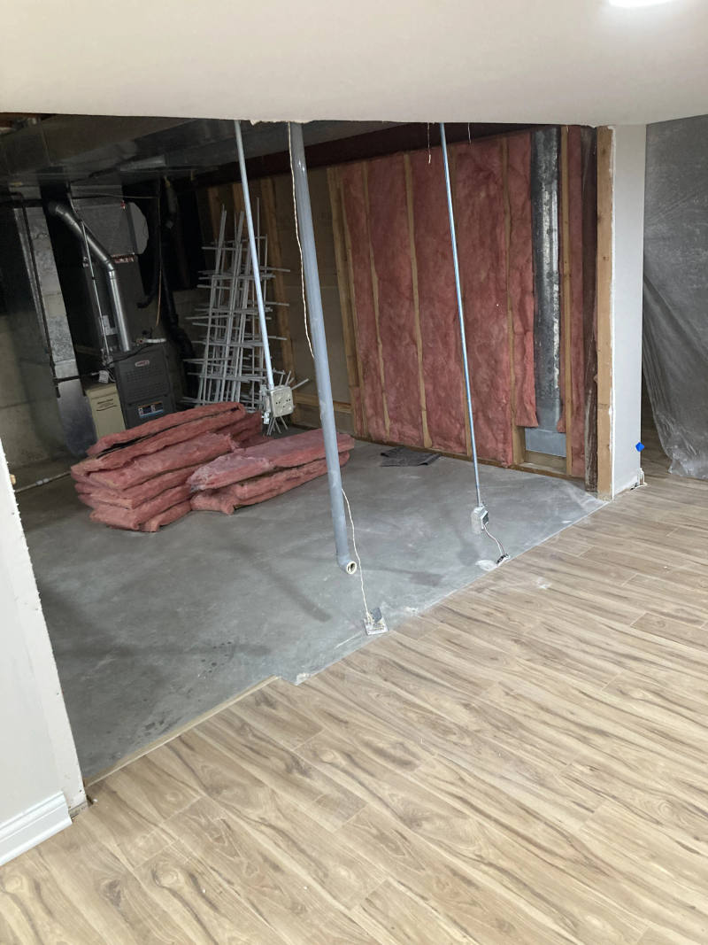 Before -- basement condition prior to renovation at Kimmer Court, Lake Forest