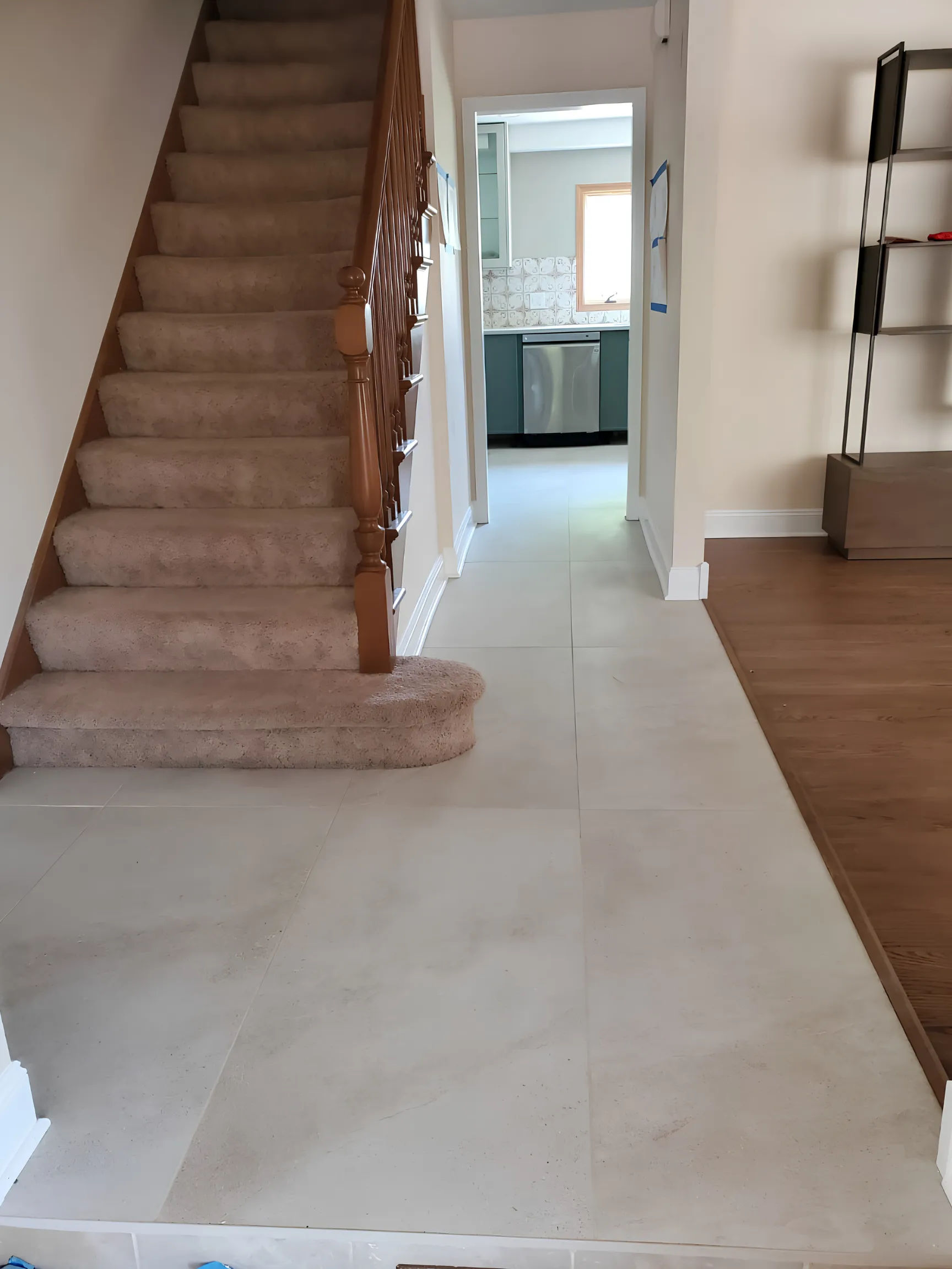 515 W Cedar St Arlington Heights front entry and hallway with new 12x24 porcelain tile replacing the original 1970s tile