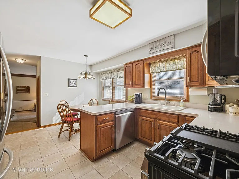 515 W Cedar St Arlington Heights original kitchen before remodel, 1973 single-family home with dropped soffits and dated cabinetry
