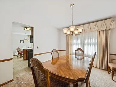 515 W Cedar St Arlington Heights original living room with wall-to-wall carpet before remodel