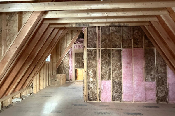 Highland Park attic before conversion -- raw unfinished attic space