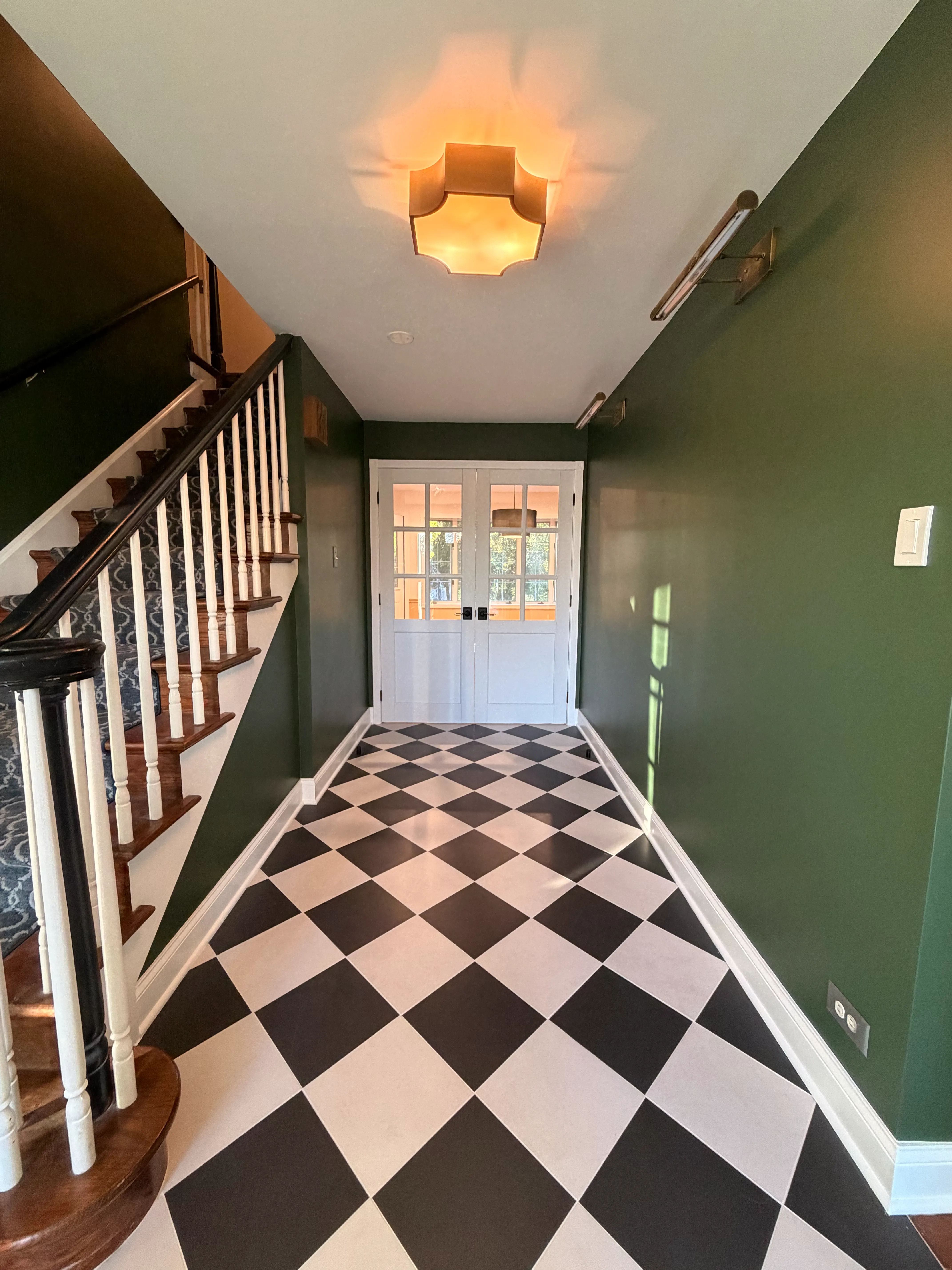 Finished Lake Forest IL estate basement -- entertainment room with premium finishes by Assembly Squad