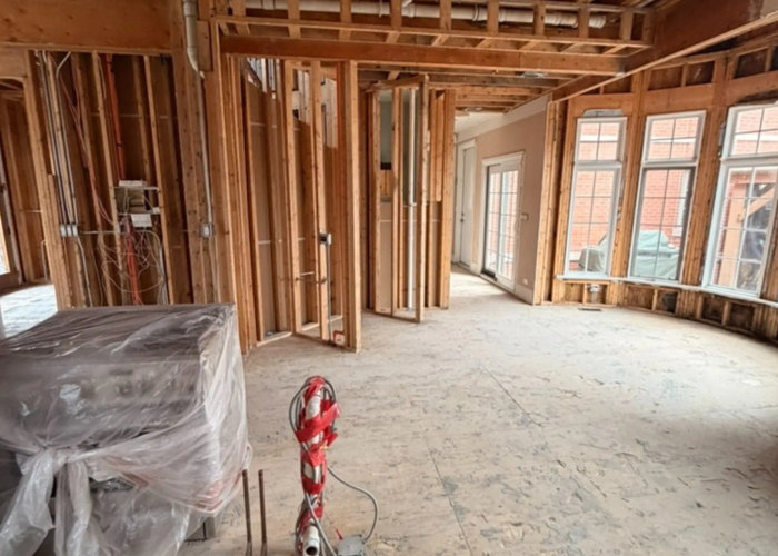 Wicker Park kitchen fully gutted before remodel -- original closed layout stripped to studs Chicago