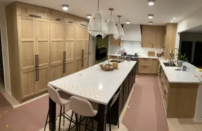 Hinsdale kitchen remodel with custom Italian walnut cabinets and MSI Calacatta quartz on S Bodin Street