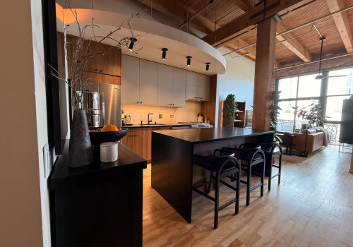 South Loop loft kitchen remodel by Assembly Squad Chicago -- open concept custom cabinetry
