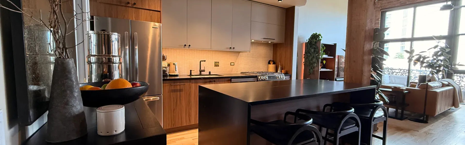South Loop chef kitchen 1632 S Indiana -- custom cabinets soapstone countertops chic modern kitchen remodel Chicago 2026