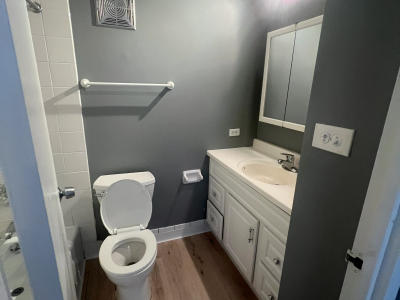 Bathroom before remodel 111 E Chestnut Chicago 60611 -- dated original tile tub