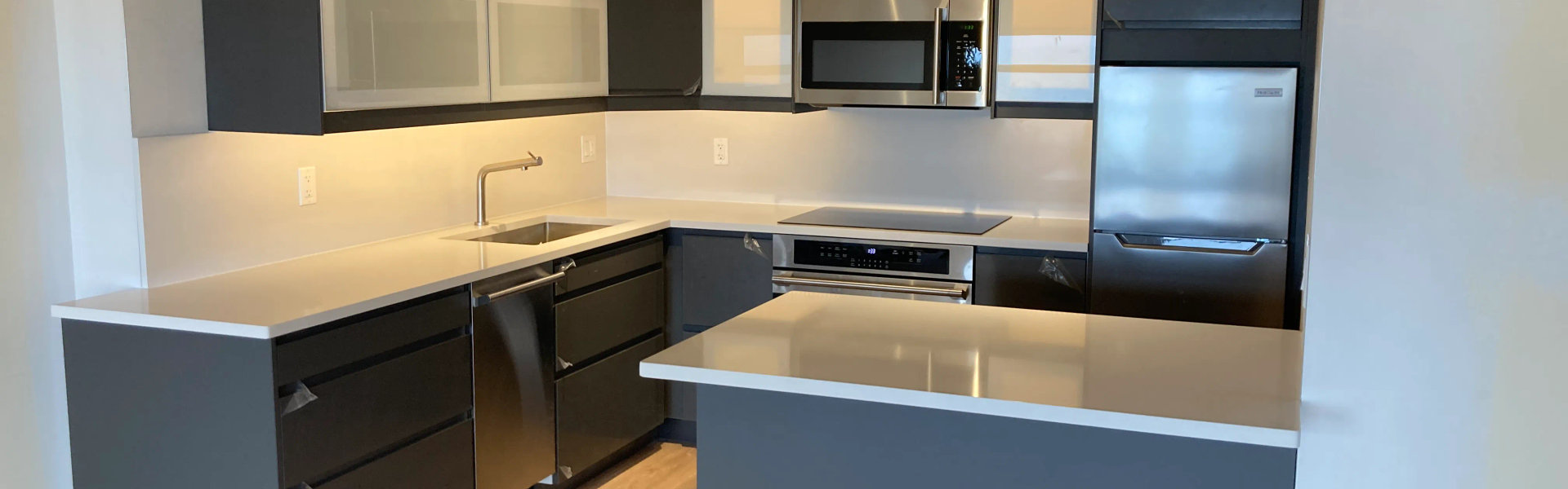 Budget IKEA kitchen under 40k Lakeview rental condo -- 2626 N Lakeview MSI white quartz new flooring investor renovation Chicago