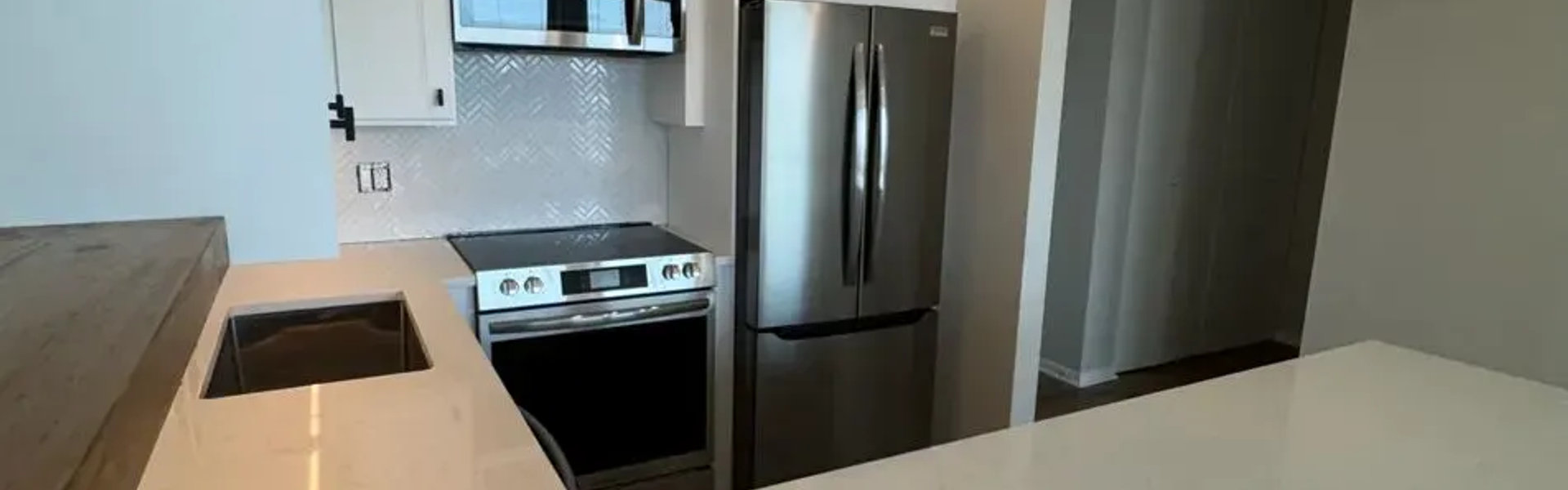 111 E Chestnut Streeterville open concept condo remodel -- wall removal kitchen quartz bathroom renovation Chicago 60611 2026