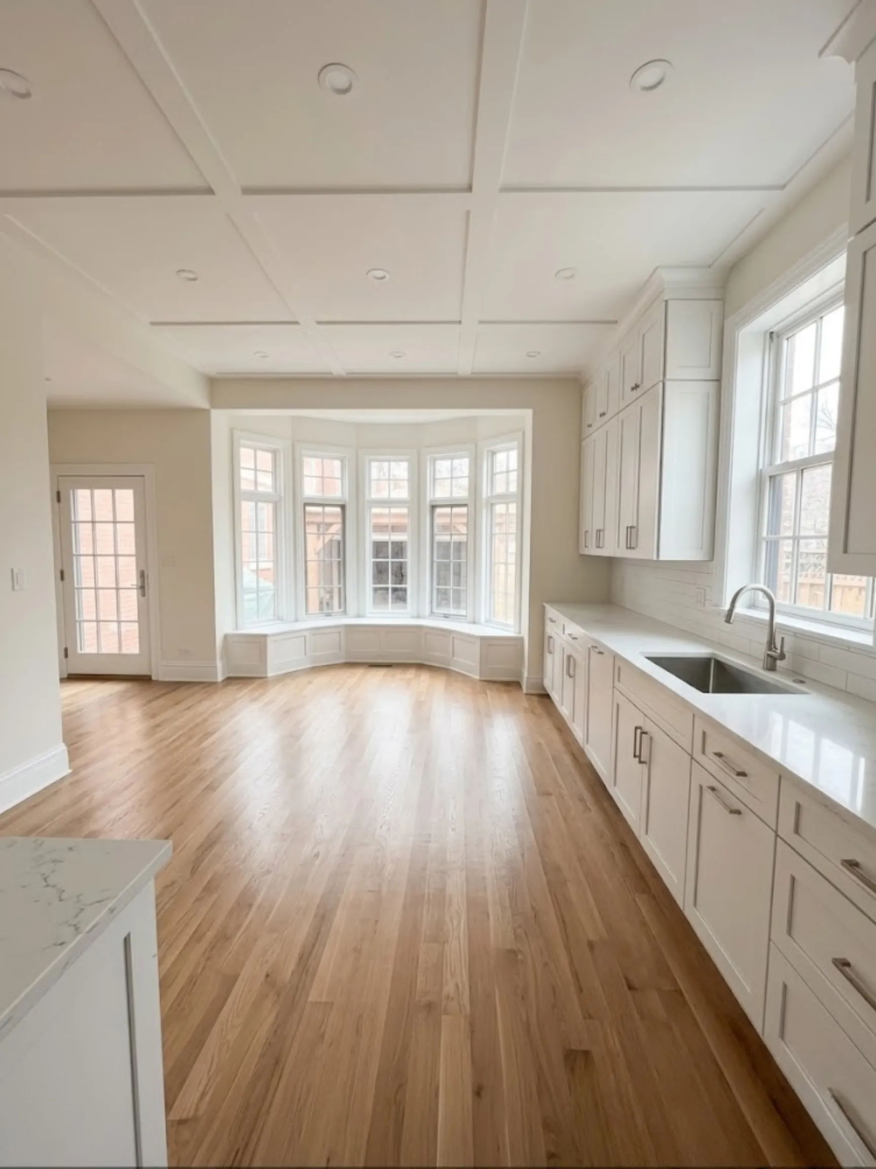 Wicker Park kitchen after remodel -- custom cabinets quartz countertops open concept Chicago