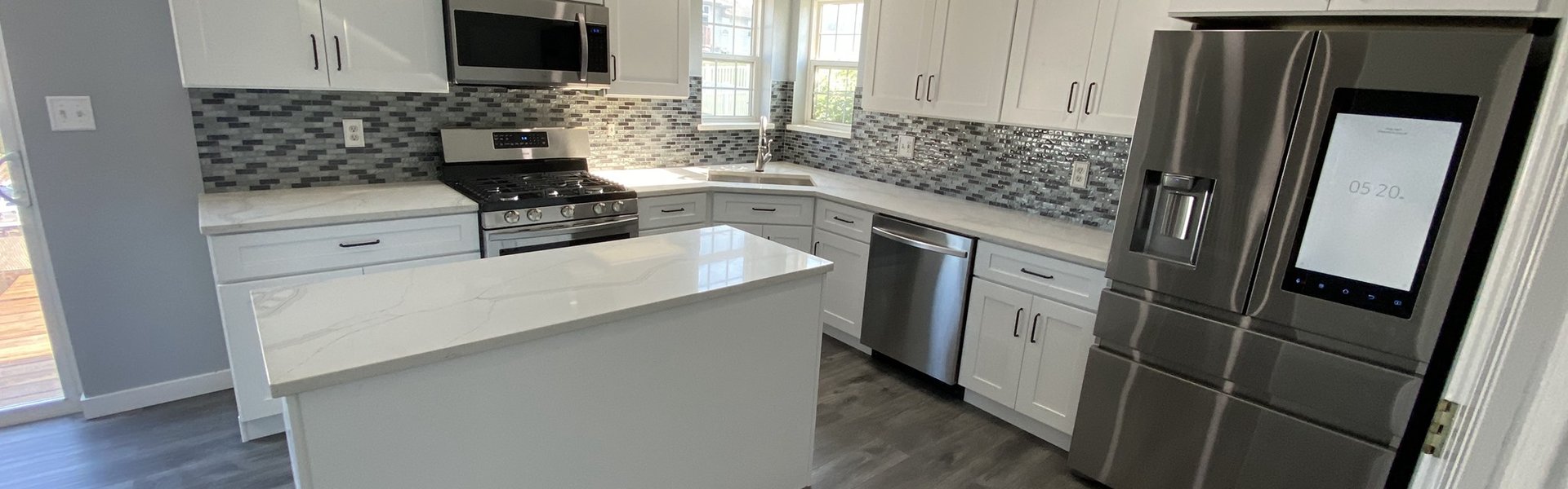 Logan Square kitchen remodel 1980s to modern 2026 -- Italian cabinets MSI Tier 1 quartz single-tone design before after Chicago
