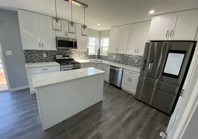 Logan Square kitchen remodeling transformation from 1980s to modern 2025 with Italian cabinets and MSI quartz