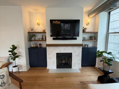Two-tone kitchen West Loop condo alternate angle -- custom cabinets quartz island