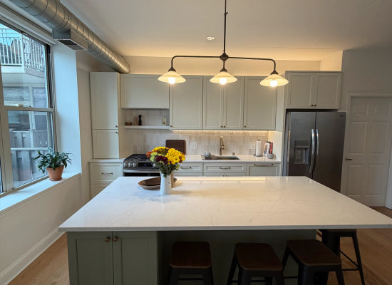 West Loop condo kitchen after remodel -- Madison St Chicago by Assembly Squad