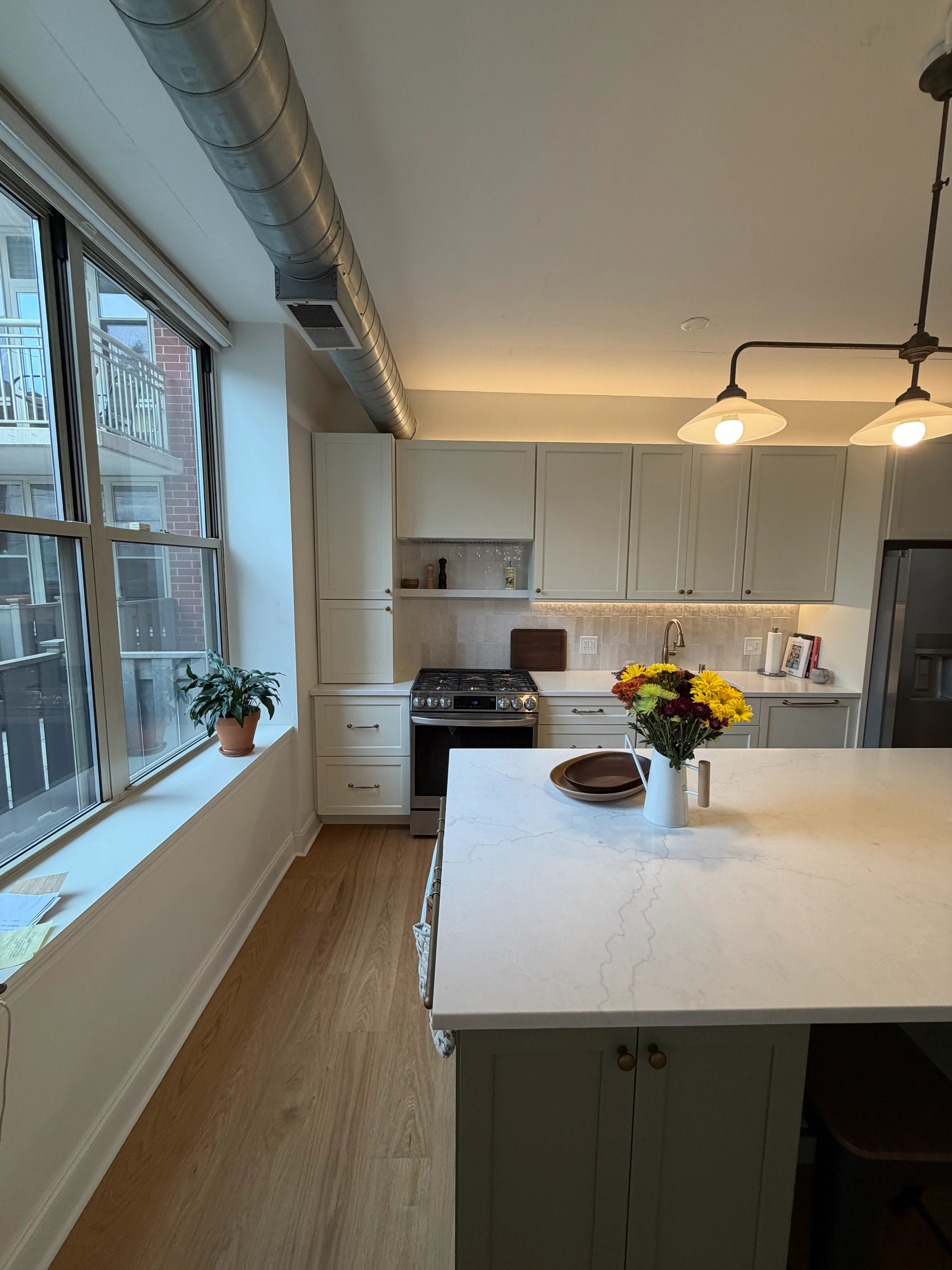 West Loop condo after remodel - kitchen island