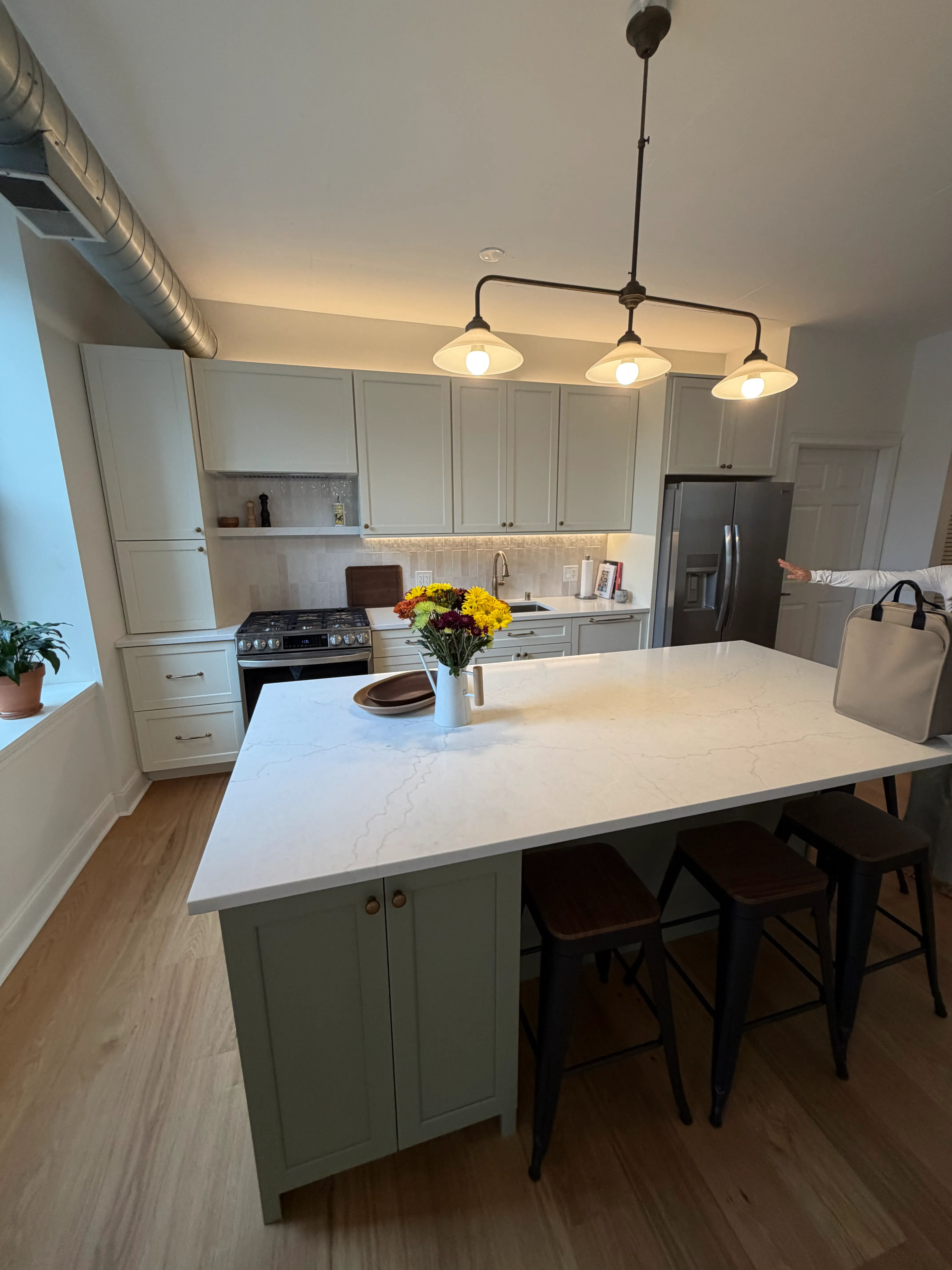 West Loop condo after remodel - two-tone cabinets
