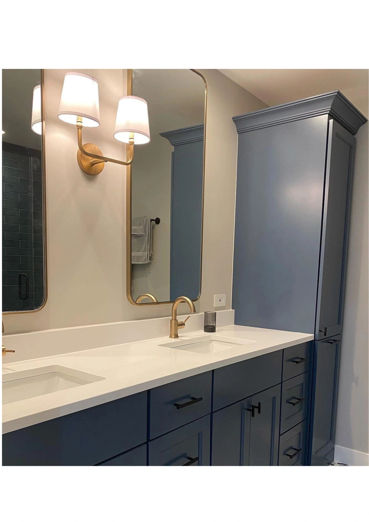 N Sheffield Avenue bathroom after renovation -- walk-in shower and matte black hardware detail