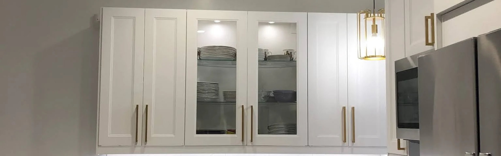 N Marshfield Ave West Town kitchen after renovation -- custom white cabinets and MSI countertops