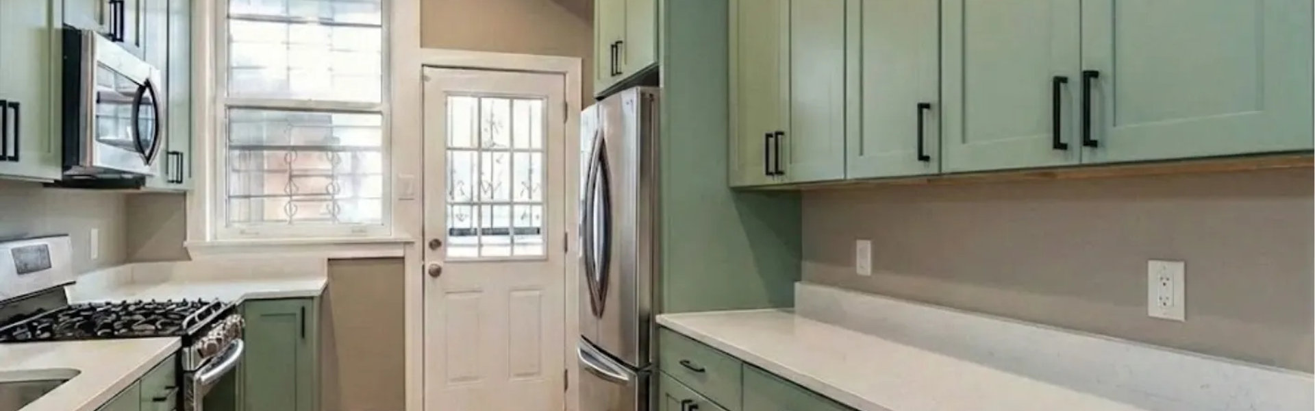 River North kitchen under 50k -- USA cabinets maple floor staining MSI quartz modern chic before after Chicago 2026