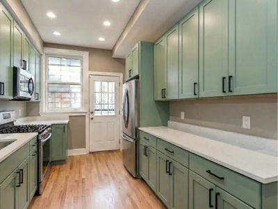 River North kitchen after remodel with custom USA-made cabinets and MSI quartz