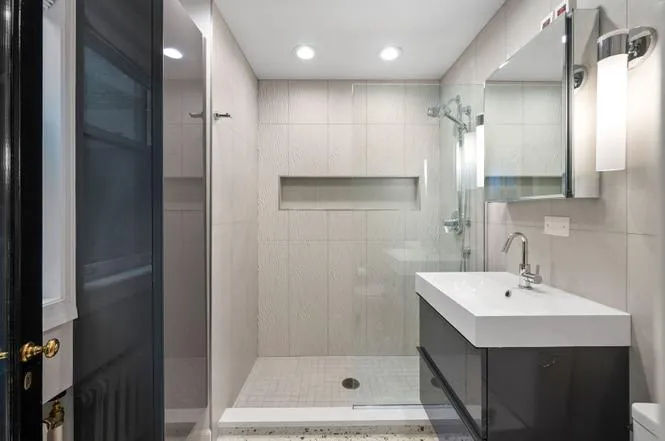 1242 N Lake Shore Drive renovated bathroom -- Gold Coast pre-war co-op modern fixtures by Assembly Squad