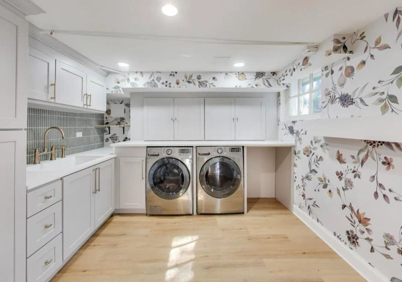 Finished Chicago basement with entertainment area and modern lighting