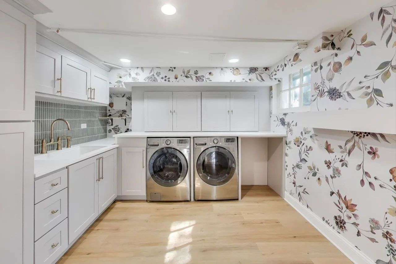 Winnetka basement after remodel with custom gray cabinets and quartz countertops