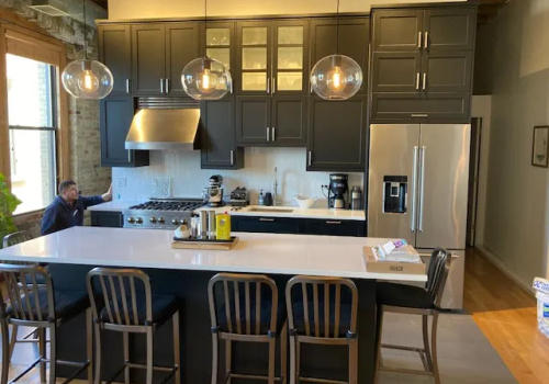 Black IKEA cabinet detail and countertop West Loop loft kitchen renovation Chicago