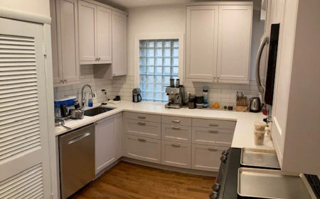 After: North Park bungalow kitchen gut renovation -- modern cabinets stone countertops 8 recessed lights