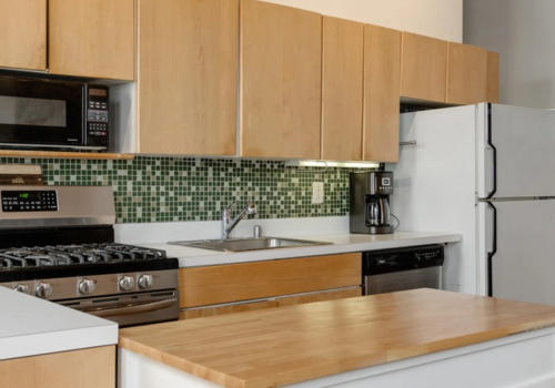 West Loop loft kitchen before view 2 -- original condition before black IKEA renovation Chicago