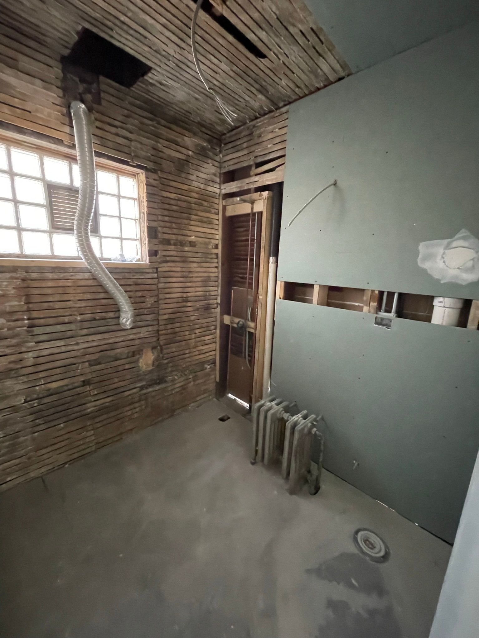 ANDERSONVILLE KITCHEN CHIMNEY DISCOVERY -- N Magnolia Ave 60640 unused chimney structure inside wall before removal during vintage home renovation