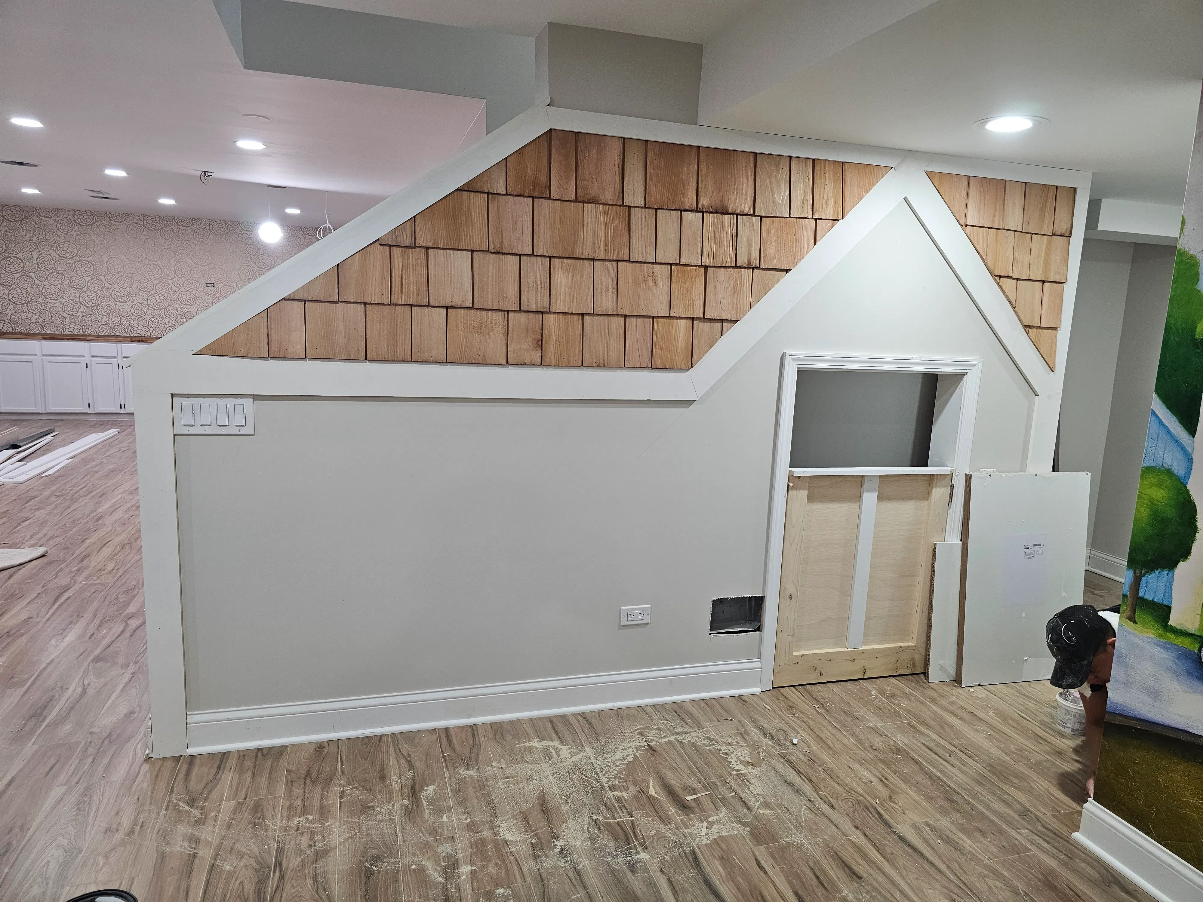 Finished Glencoe basement recreation room with quality finishes and recessed lighting
