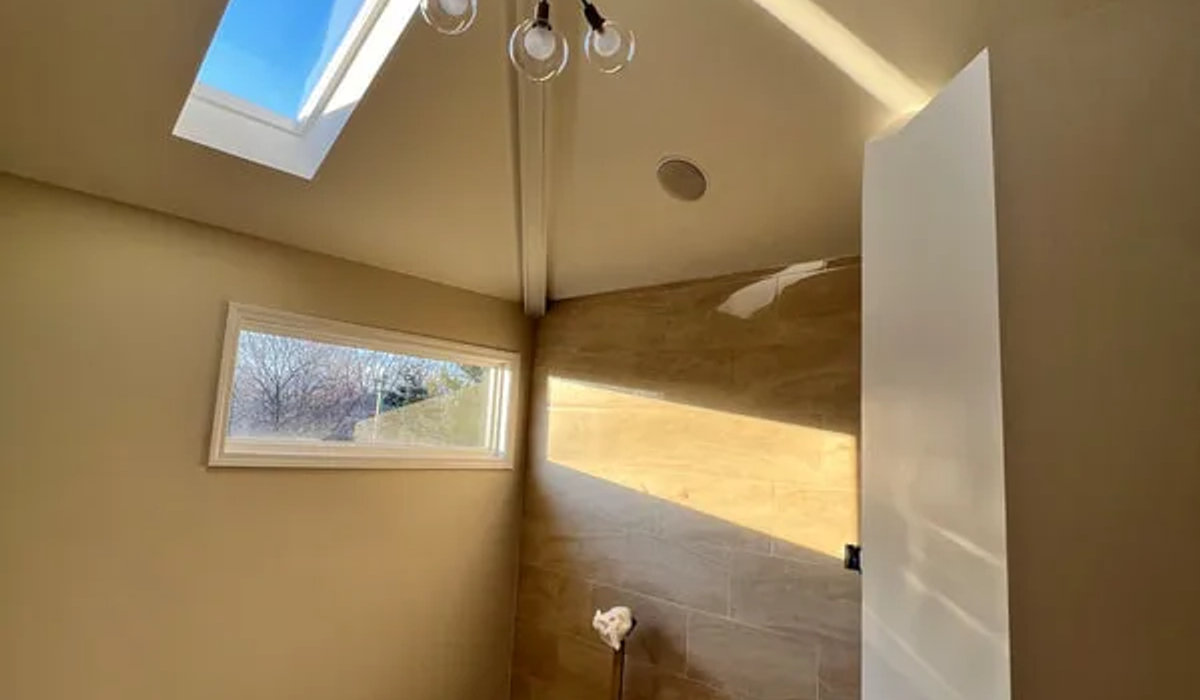 Bucktown spa bathroom remodel -- walk-in shower separated, custom tile walls and floors, light modern design Chicago