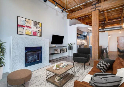 Full loft renovation Chicago -- complete gut remodel with custom cabinetry and open plan design by Assembly Squad
