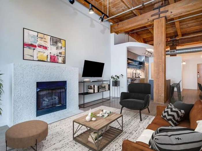 Chicago loft kitchen remodeling -- industrial open concept design by Assembly Squad