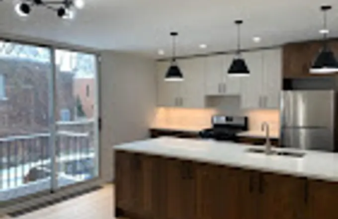 Hyde Park open concept townhouse kitchen with structural wall removal by Assembly Squad