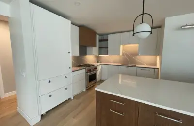 Modern IKEA kitchen in Bucktown with two-tone cabinets and wet bar area