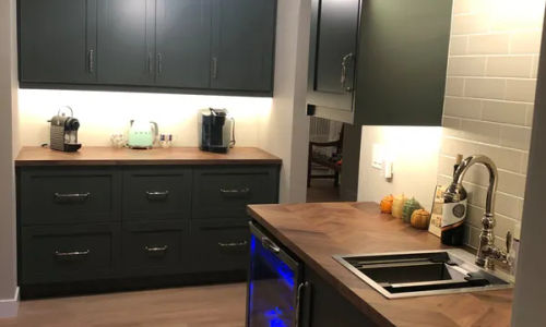 Lincoln Park condo remodeling - waterfall quartz kitchen
