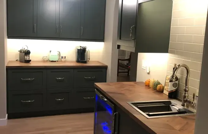 Luxury Lincoln Park kitchen with waterfall quartz island by Assembly Squad